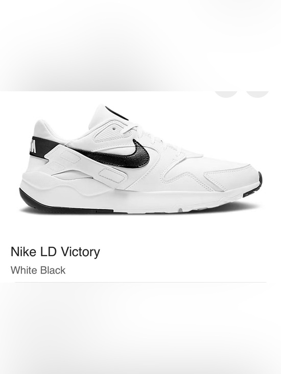 Nike Shoes - Nike White Sneakers with Black Swoosh Accent